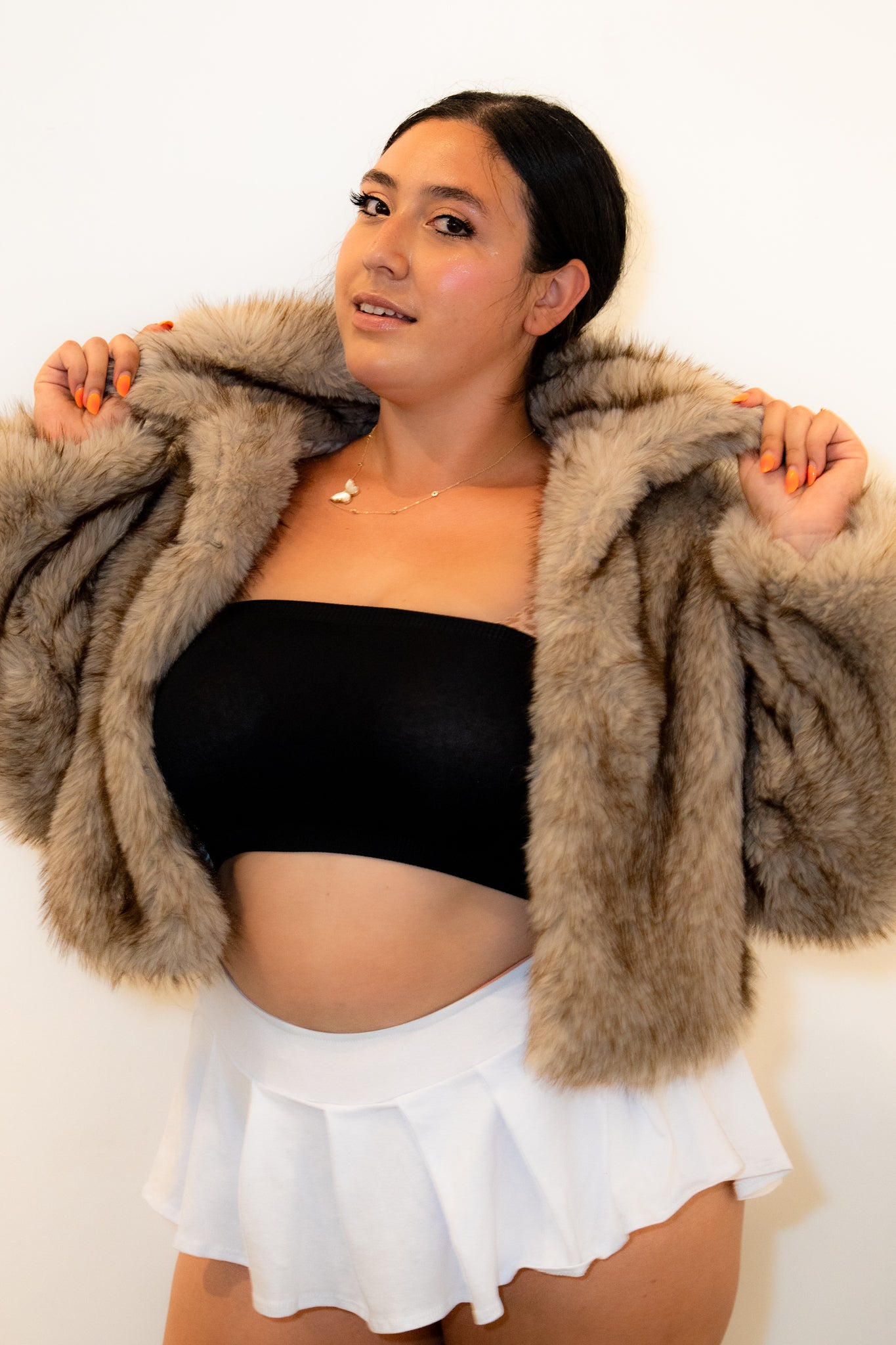 light brown faux fur coat short mid waist true to size. Date night vibes, cute trendy winter jacket.