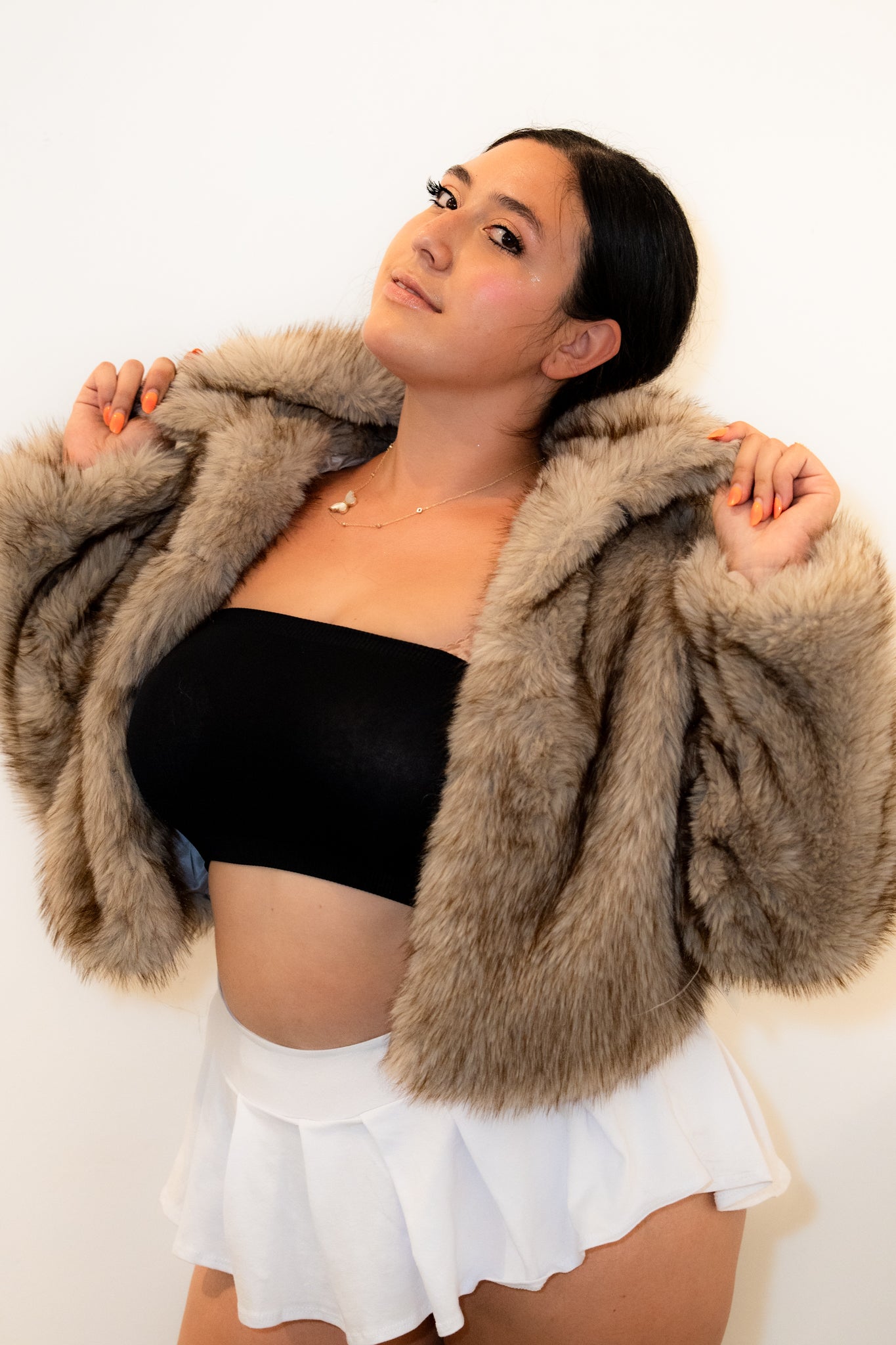 light brown faux fur coat short mid waist true to size. Date night vibes, cute trendy winter jacket.