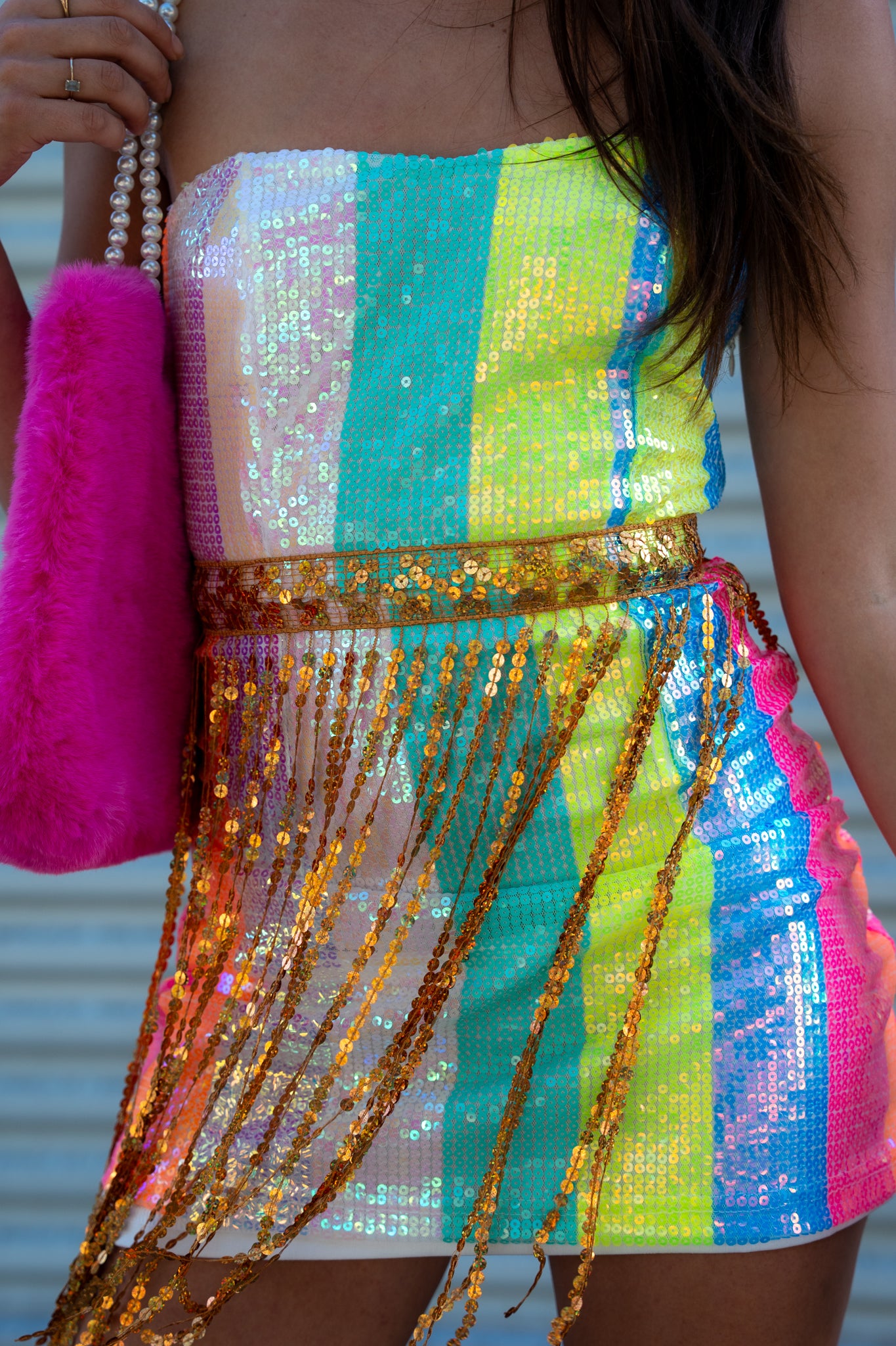 Rainbow striped mini dress with sparkling gold tassels. Lightweight, flirty, and perfect for raves, festivals, parties, or nights out. mini dress.