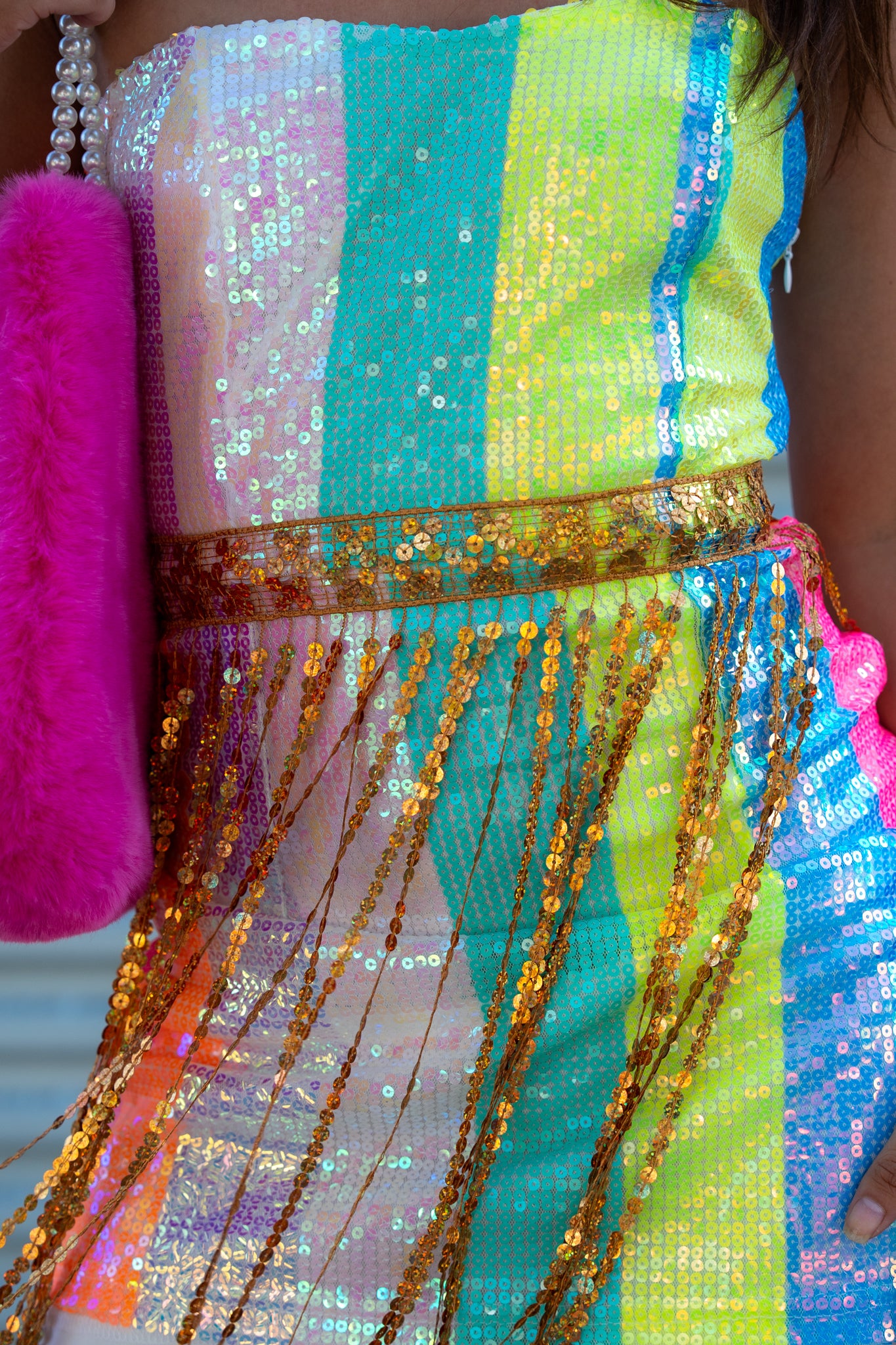 Rainbow striped mini dress with sparkling gold tassels. Lightweight, flirty, and perfect for raves, festivals, parties, or nights out. mini dress.