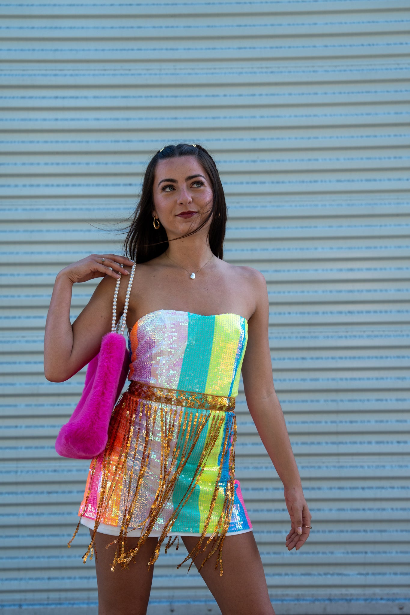 Rainbow striped mini dress with sparkling gold tassels. Lightweight, flirty, and perfect for raves, festivals, parties, or nights out. mini dress.