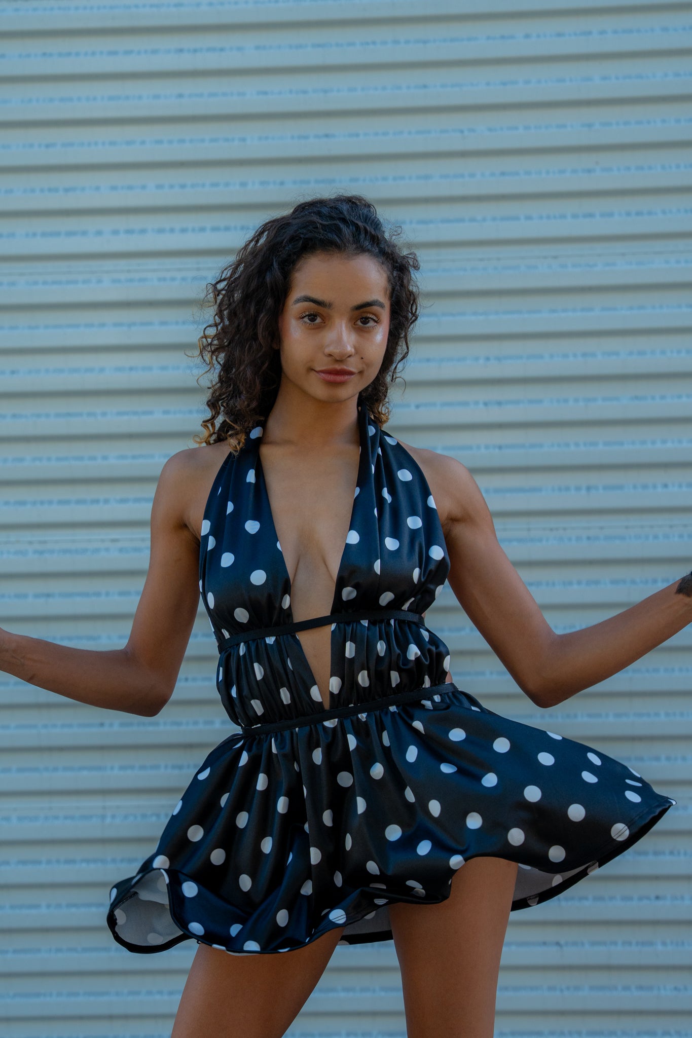 Lightweight, flowy black-and-white polka dot skort dress. Silk-feel, flirty, and very comfortable — ideal for festivals, parties, or nights out.